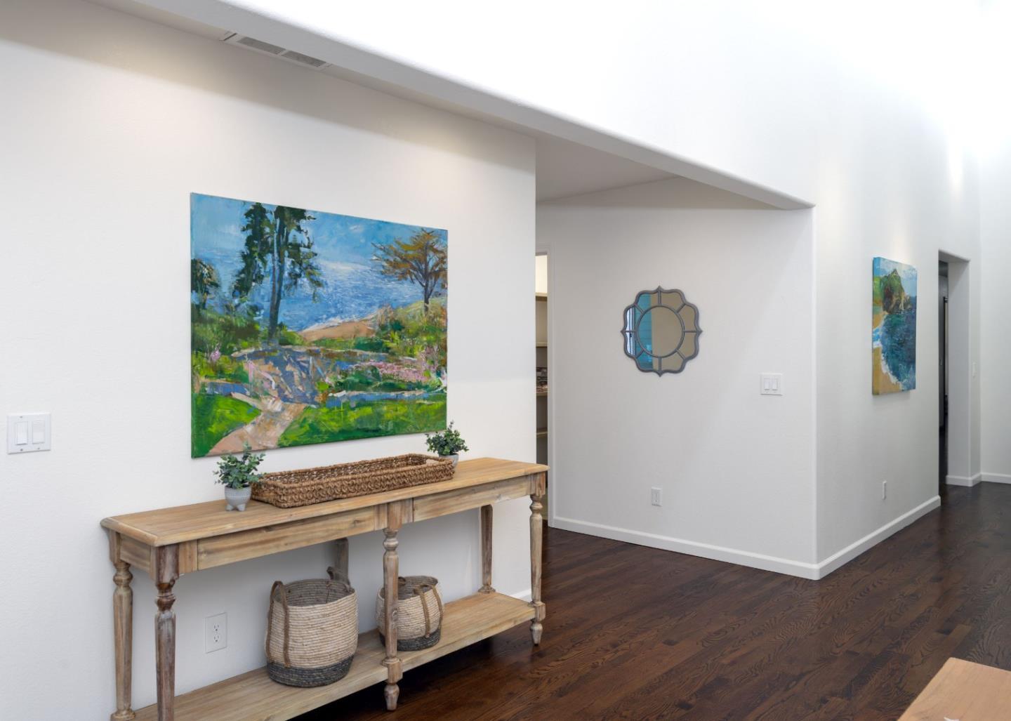 573 Meadow Road Aptos, CA 95003 - Photo 10 of 53 a room with wooden floor and window