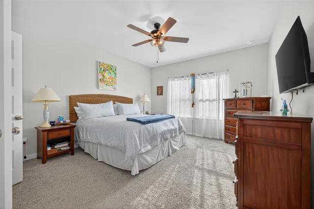 a bathroom with double sink and a mirror