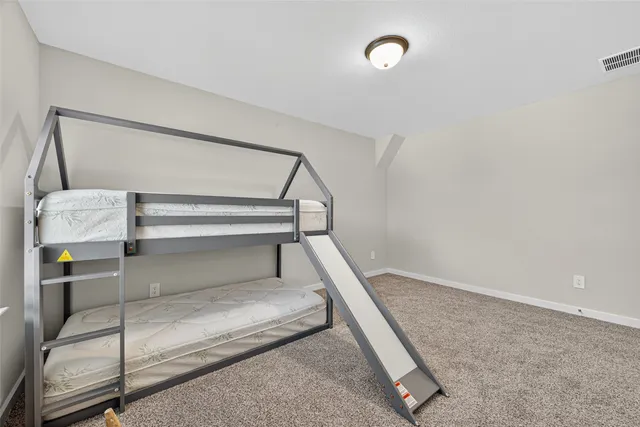 a view of a garden with a slide