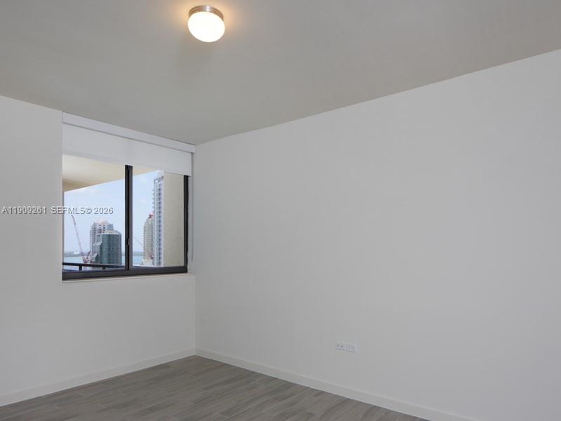 999 Southwest 1st Avenue, Unit 2016 Miami, FL 33130 - Photo 25 of 49 a view of an empty room