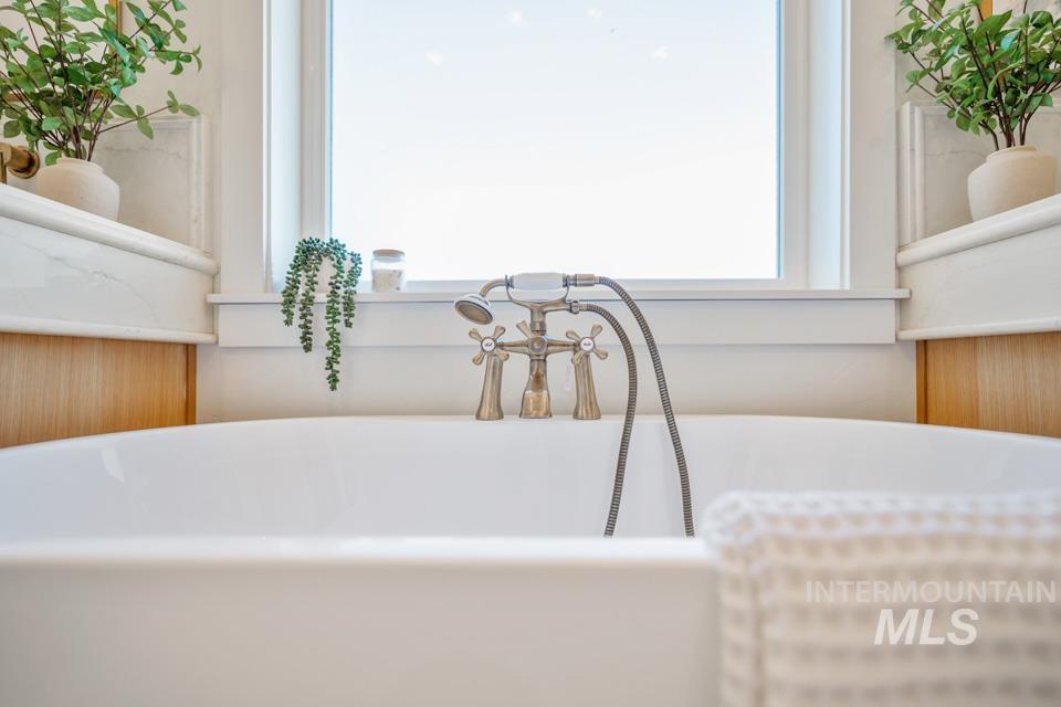 3322 South Volunteer Place Meridian, ID 83642 - Photo 36 of 50 Bathroom view of a freestanding tub and vanity