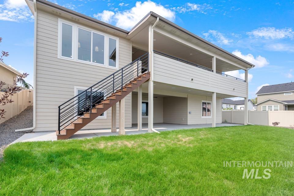 3322 South Volunteer Place Meridian, ID 83642 - Photo 49 of 50 Back of house with a fenced backyard, a patio, stairway, and a deck
