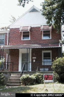 819 St Dunstans Road Baltimore, MD 21212 - Photo 1 of 1 a front view of a house with garden