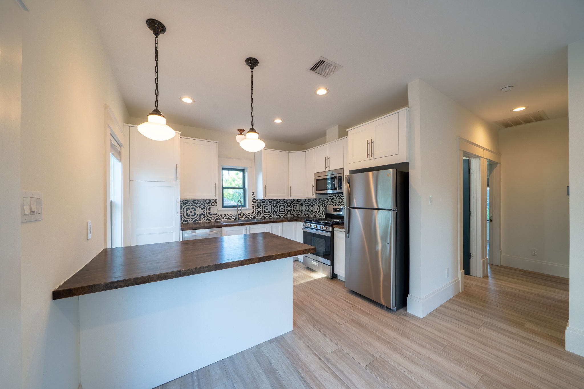 1109 Rutland Street Houston, TX 77008 - Photo 26 of 34 This charming garage apartment kitchen is as functional as it is inviting. Outfitted with a brand-new refrigerator, dishwasher, and stove, it's ready to handle everything from quick breakfasts to gourmet meals. With generous countertop and prep space, you'll have all the room you need to chop, mix, and create with ease. Modern convenience meets everyday practicality in this thoughtfully designed space.
