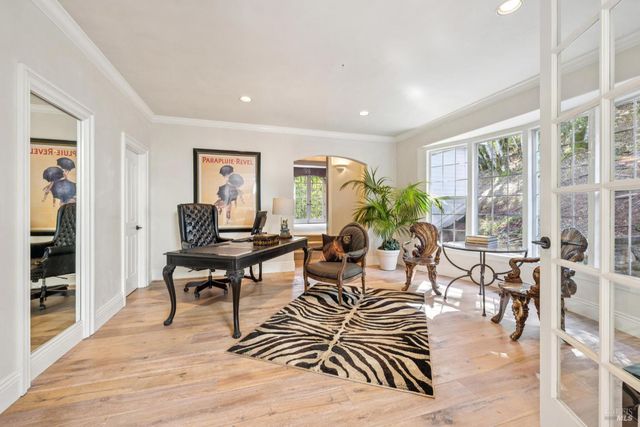 swimming pool with outdoor seating and trees