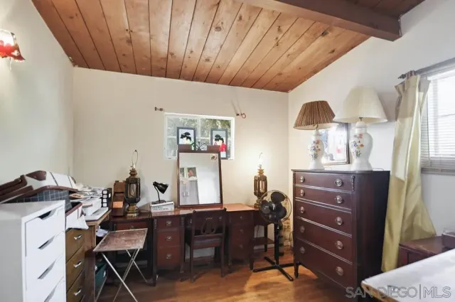 a view of a workspace with furniture