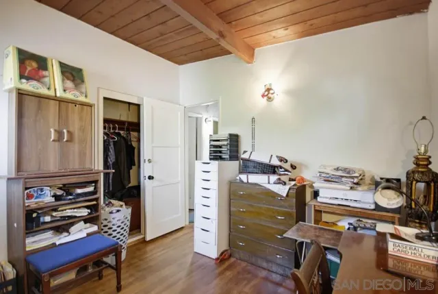 a view of a workspace with furniture