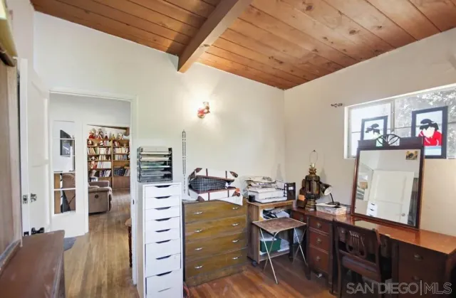 a view of a workspace with furniture
