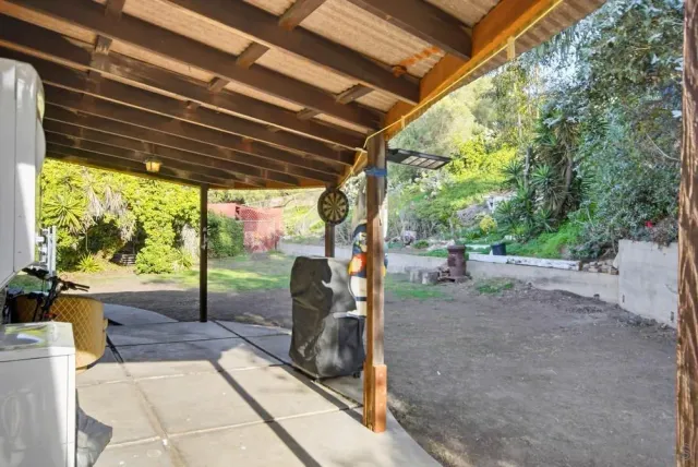 a view of backyard with green space