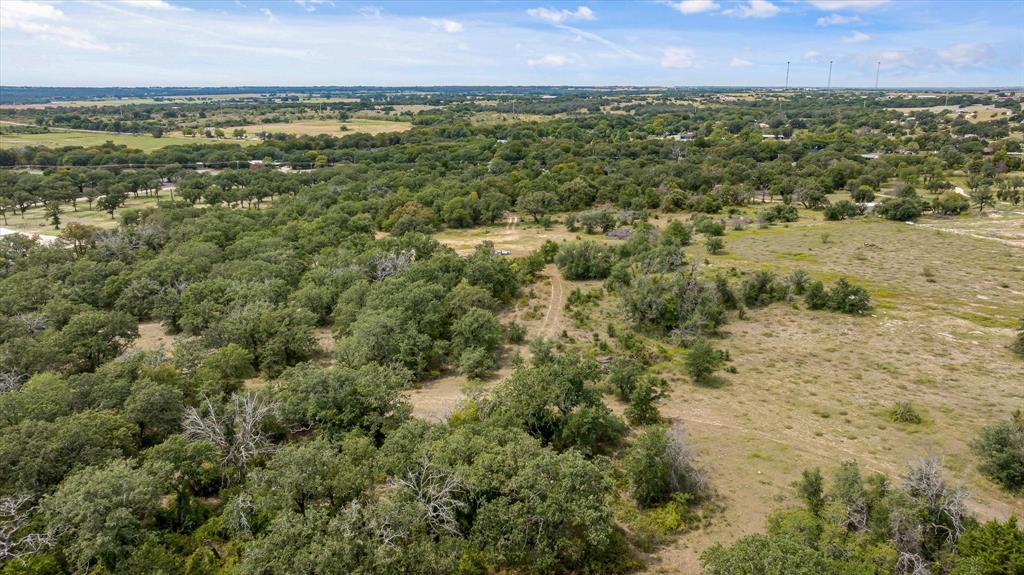 10015 Highway 377 Dublin, TX 76446 - Photo 14 of 17 a view of a city with tall buildings