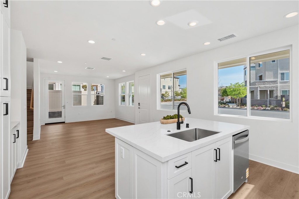 31645 Williams Rancho Mission Rancho Mission Viejo, CA 92694 - Photo 11 of 58 a kitchen with stainless steel appliances a sink and a large window