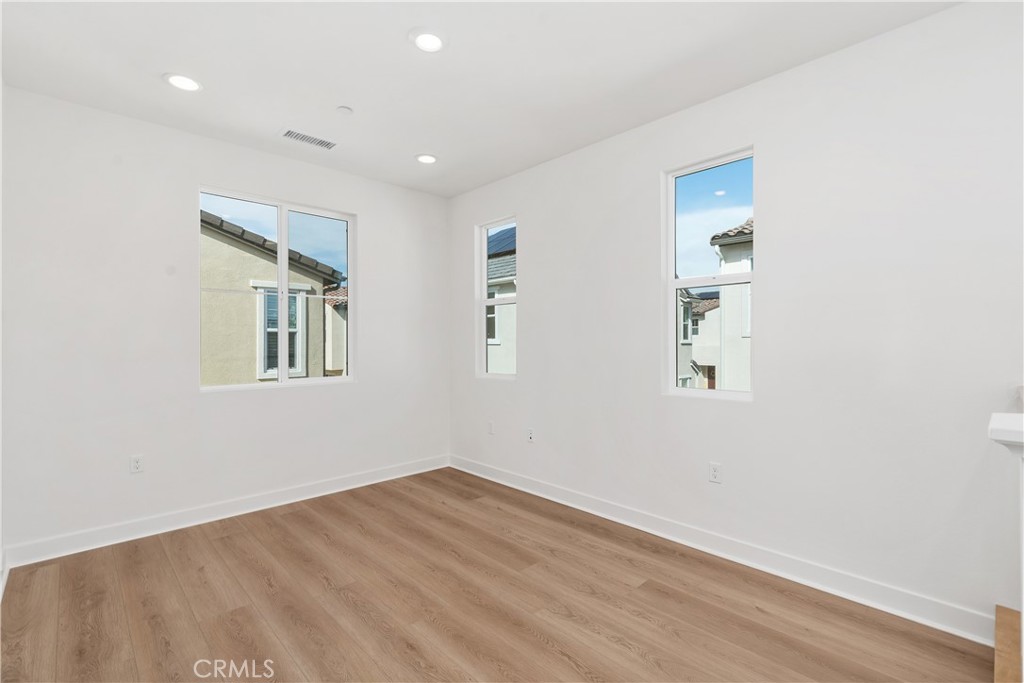 31645 Williams Rancho Mission Rancho Mission Viejo, CA 92694 - Photo 15 of 58 a view of empty room with wooden floor and fan