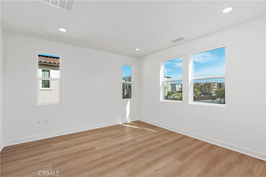 31645 Williams Rancho Mission Rancho Mission Viejo, CA 92694 - Photo 17 of 58 a view of empty room with wooden floor and fan