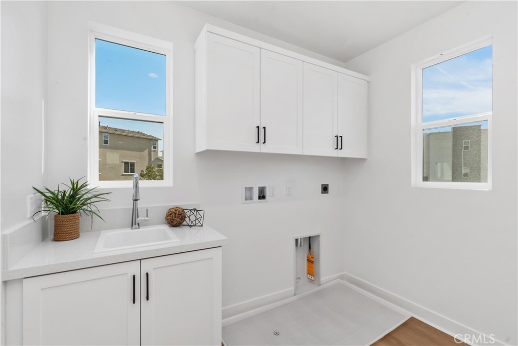31645 Williams Rancho Mission Rancho Mission Viejo, CA 92694 - Photo 23 of 58 a kitchen with a sink a window and cabinets