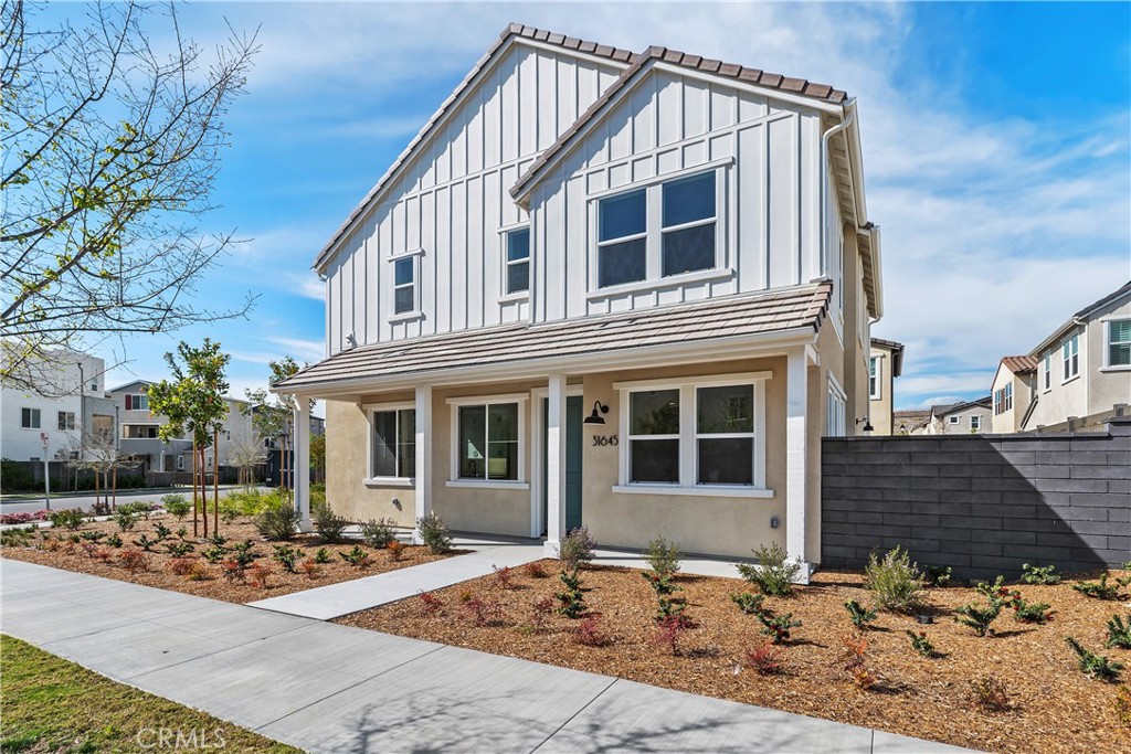 31645 Williams Rancho Mission Rancho Mission Viejo, CA 92694 - Photo 3 of 58 a front view of a house with garden