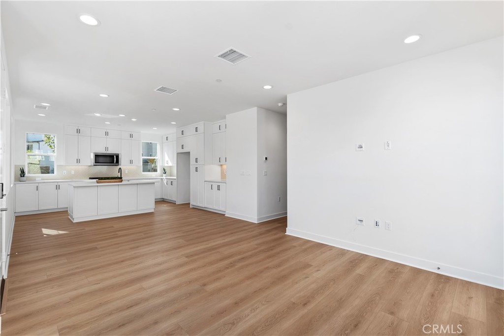 31645 Williams Rancho Mission Rancho Mission Viejo, CA 92694 - Photo 5 of 58 a view of kitchen with wooden floor