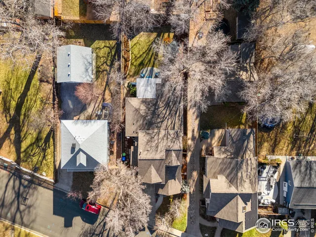 an aerial view of a house with outdoor space