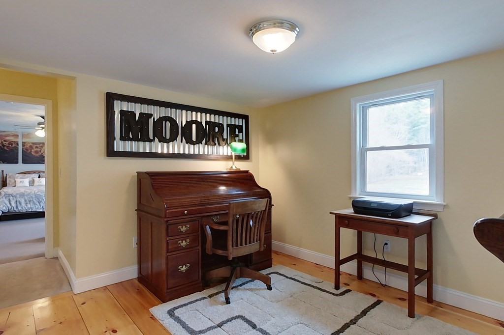 384 Richardson Road Ashby, MA 01431 - Photo 16 of 40 a view of a workspace with furniture and a window