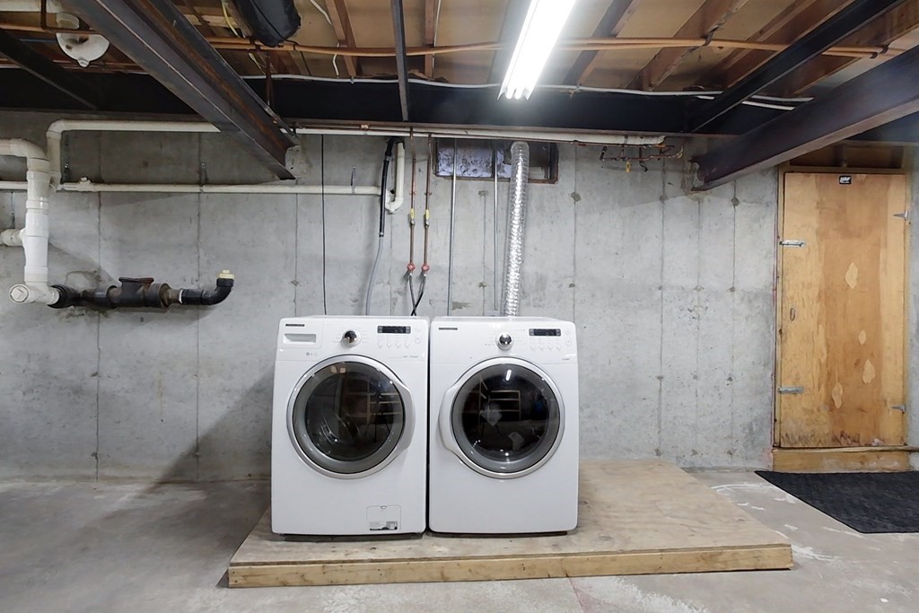 384 Richardson Road Ashby, MA 01431 - Photo 30 of 40 a utility room with dryer and washer