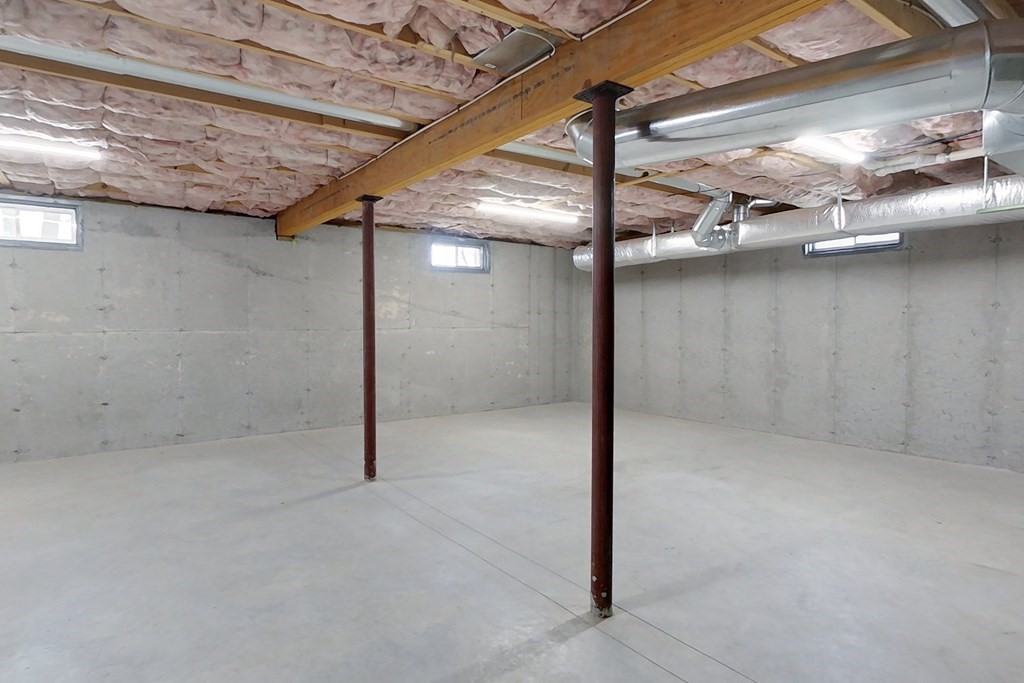 384 Richardson Road Ashby, MA 01431 - Photo 31 of 40 a view of a room with wooden shelves