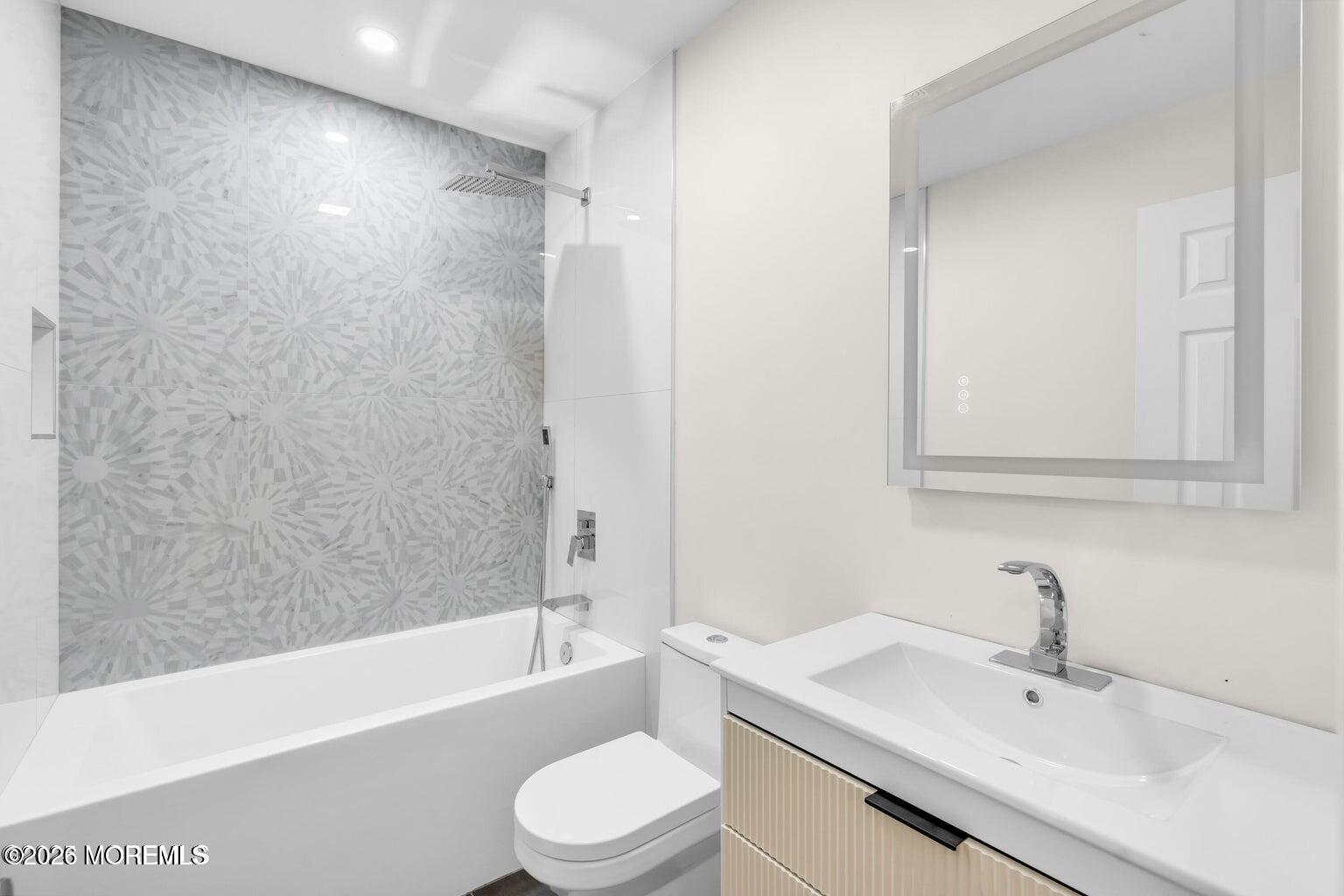 88 Hickory Hill Road Jackson, NJ 08527 - Photo 19 of 21 a bathroom with a sink a toilet and bathtub