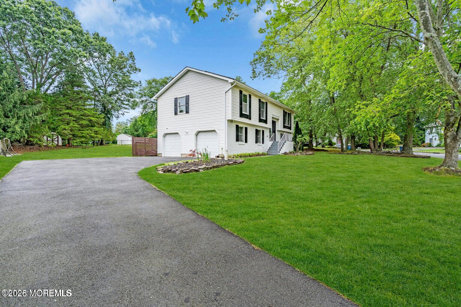 88 Hickory Hill Road Jackson, NJ 08527 - Photo 3 of 21 a view of a house with a yard and sitting area