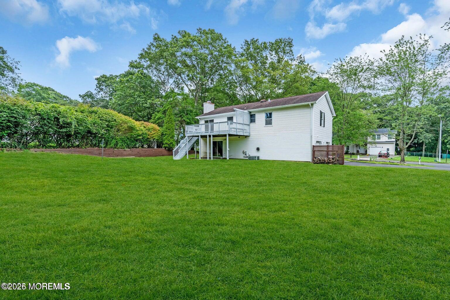 88 Hickory Hill Road Jackson, NJ 08527 - Photo 5 of 21 a house view with a garden space