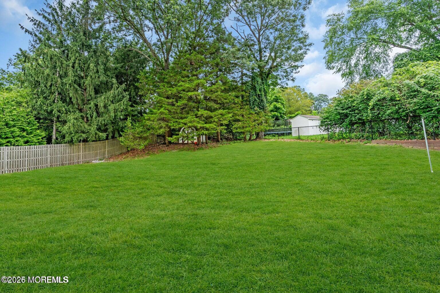 88 Hickory Hill Road Jackson, NJ 08527 - Photo 9 of 21 a view of a field of grass and trees