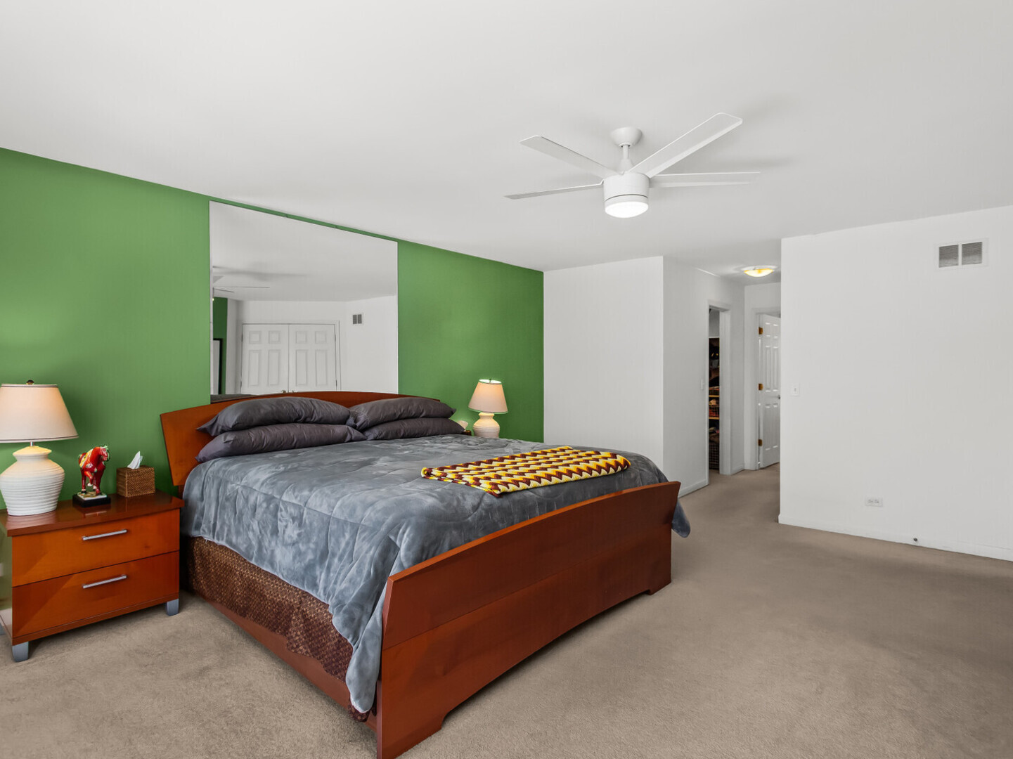 2008 Jordan Terrace Buffalo Grove, IL 60089 - Photo 14 of 33 a bedroom with a bed and a chandelier