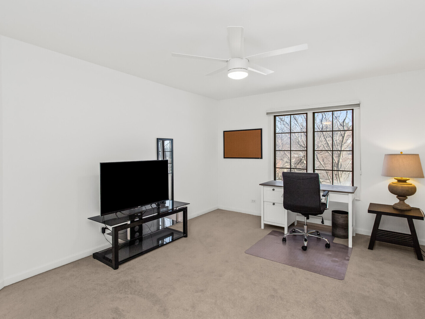 2008 Jordan Terrace Buffalo Grove, IL 60089 - Photo 17 of 33 a view of a workspace with furniture and a window