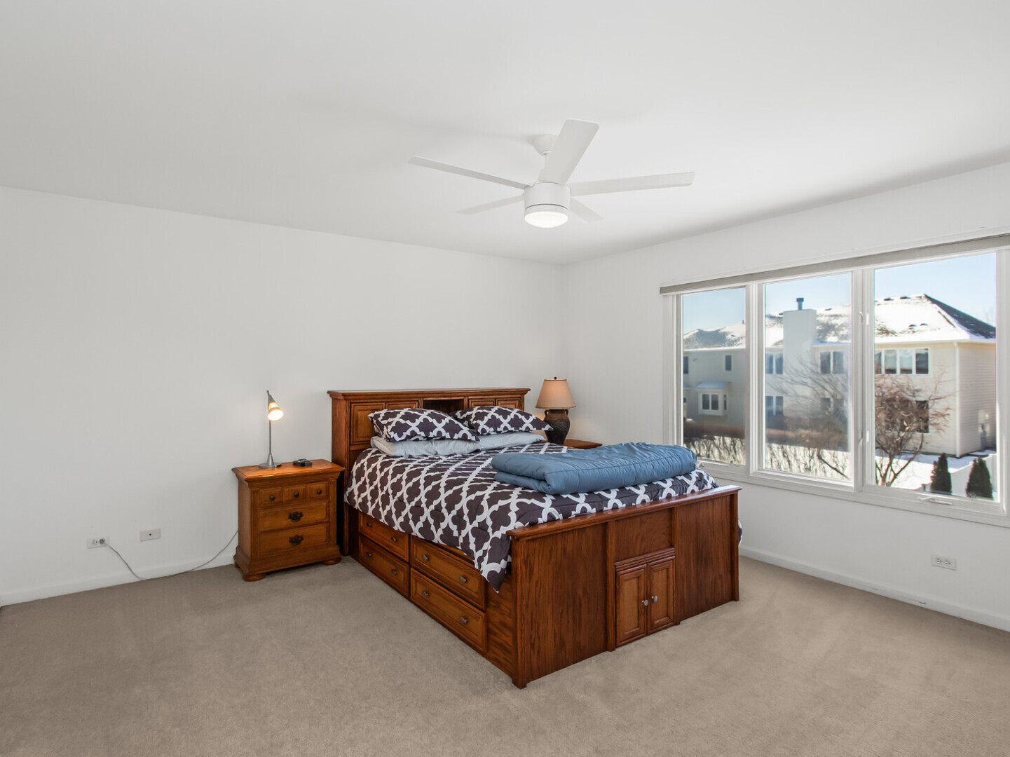 2008 Jordan Terrace Buffalo Grove, IL 60089 - Photo 18 of 33 a bed sitting in a room next to a balcony