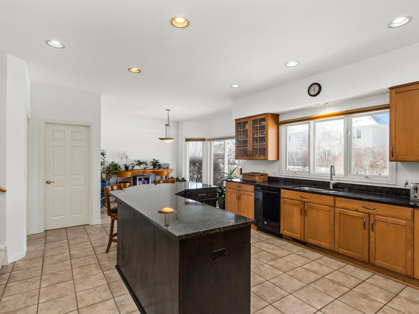 2008 Jordan Terrace Buffalo Grove, IL 60089 - Photo 5 of 33 a kitchen with granite countertop a sink and cabinets