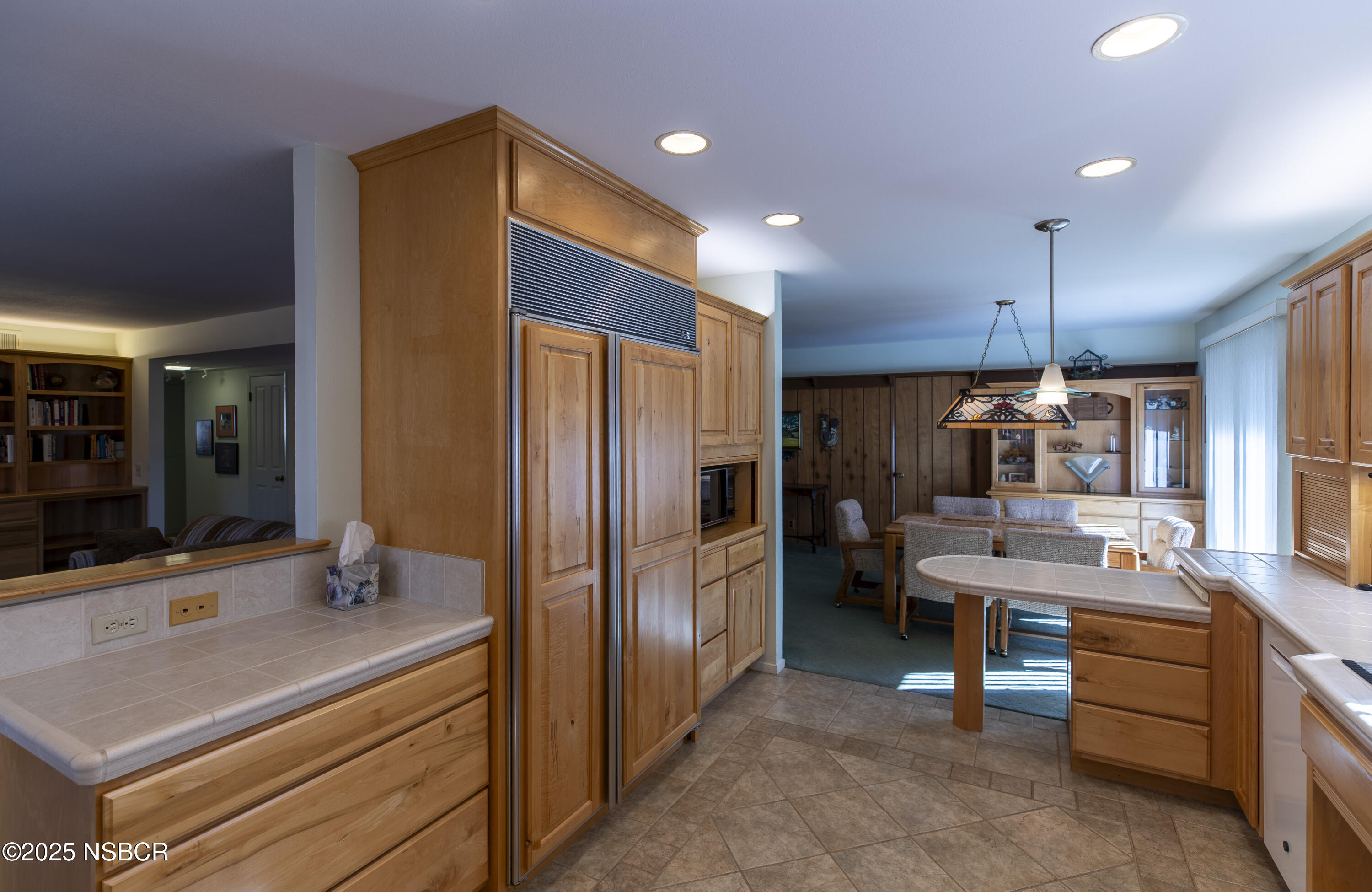 4490 Sirius Avenue Lompoc, CA 93436 - Photo 11 of 55 a kitchen with kitchen island a counter top space stainless steel appliances and cabinets