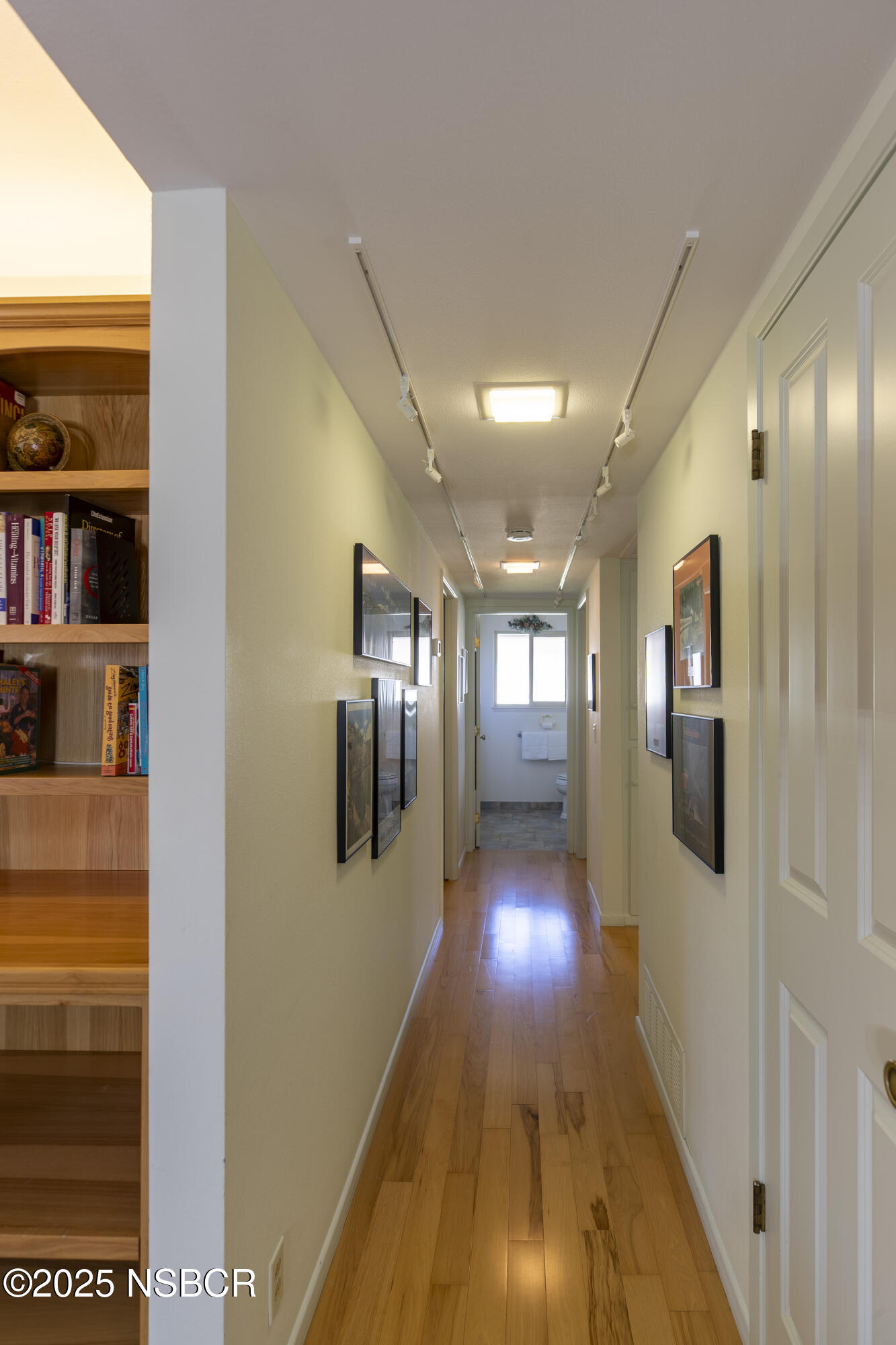 4490 Sirius Avenue Lompoc, CA 93436 - Photo 18 of 55 a view of a hallway with wooden floor