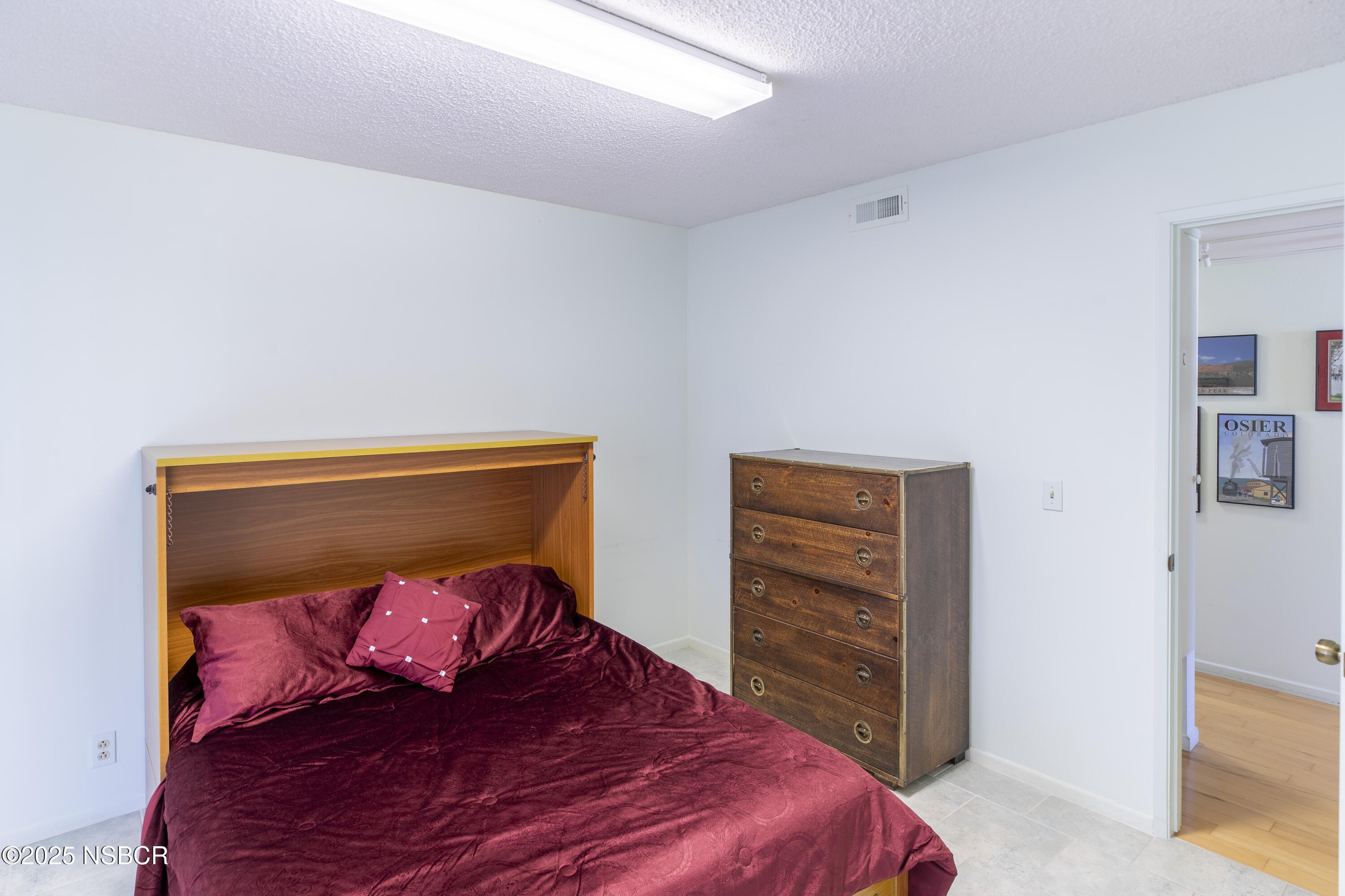4490 Sirius Avenue Lompoc, CA 93436 - Photo 21 of 55 a bedroom with a bed and a closet