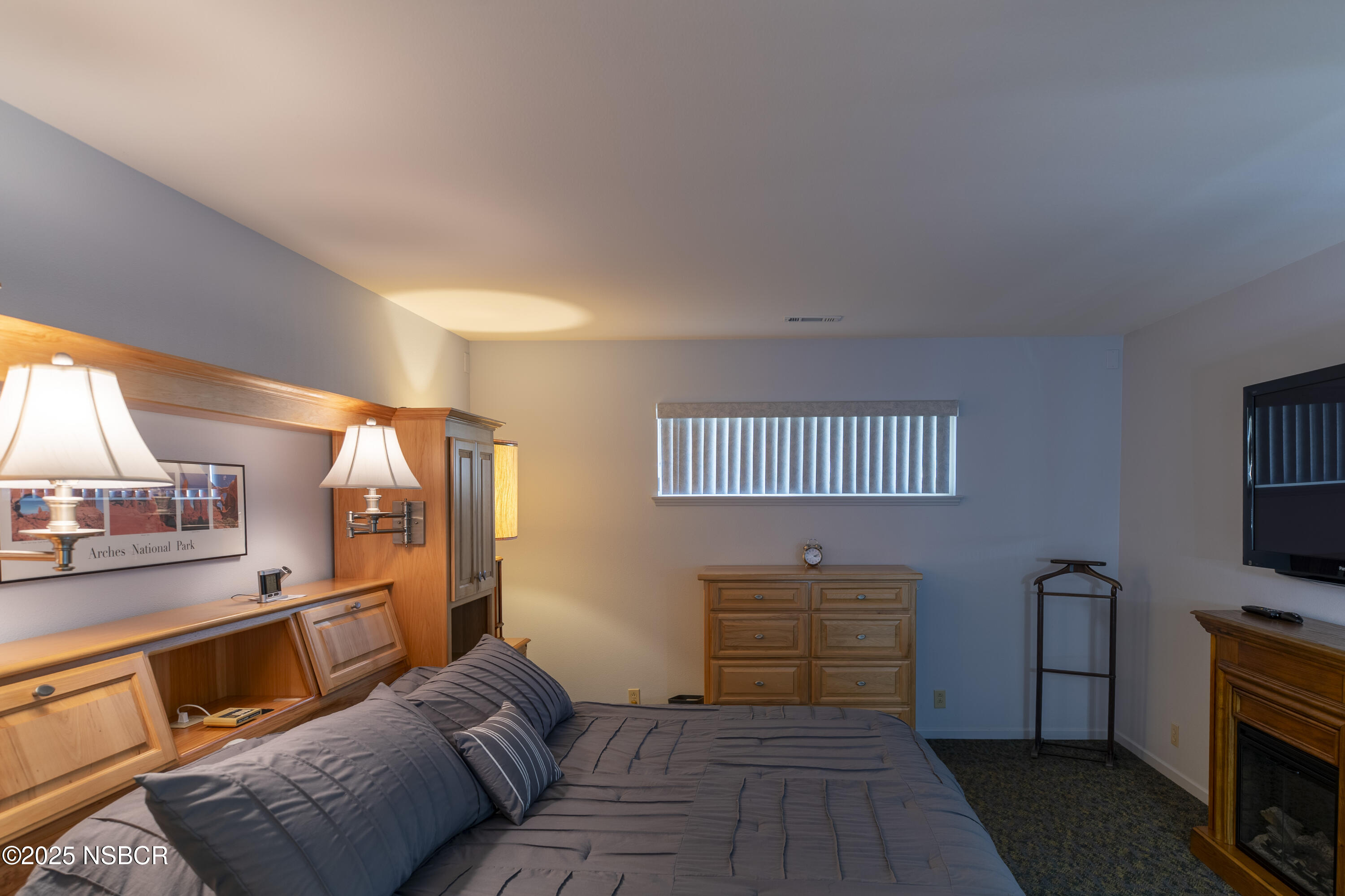 4490 Sirius Avenue Lompoc, CA 93436 - Photo 38 of 55 a living room with furniture and a flat screen tv
