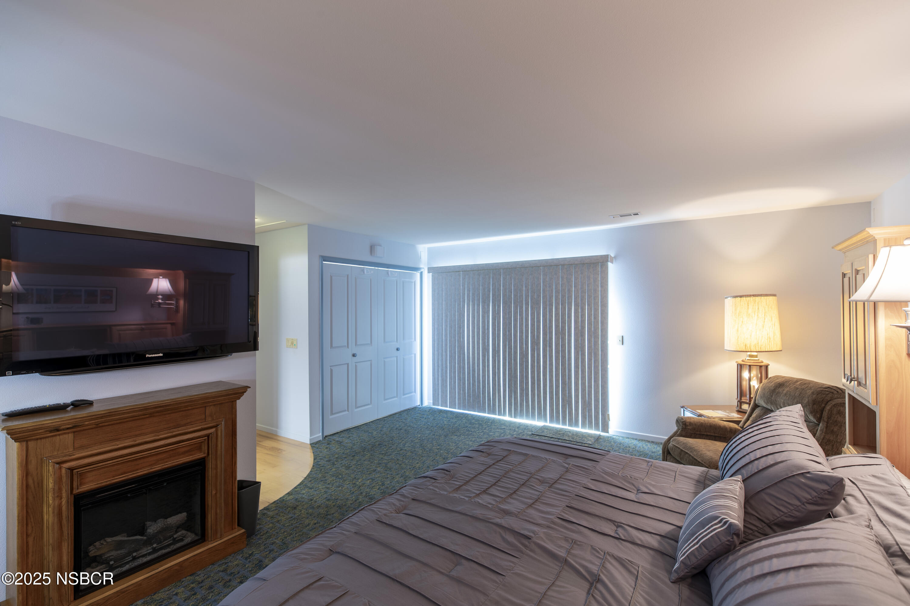 4490 Sirius Avenue Lompoc, CA 93436 - Photo 39 of 55 a bedroom with a bed and a flat screen tv