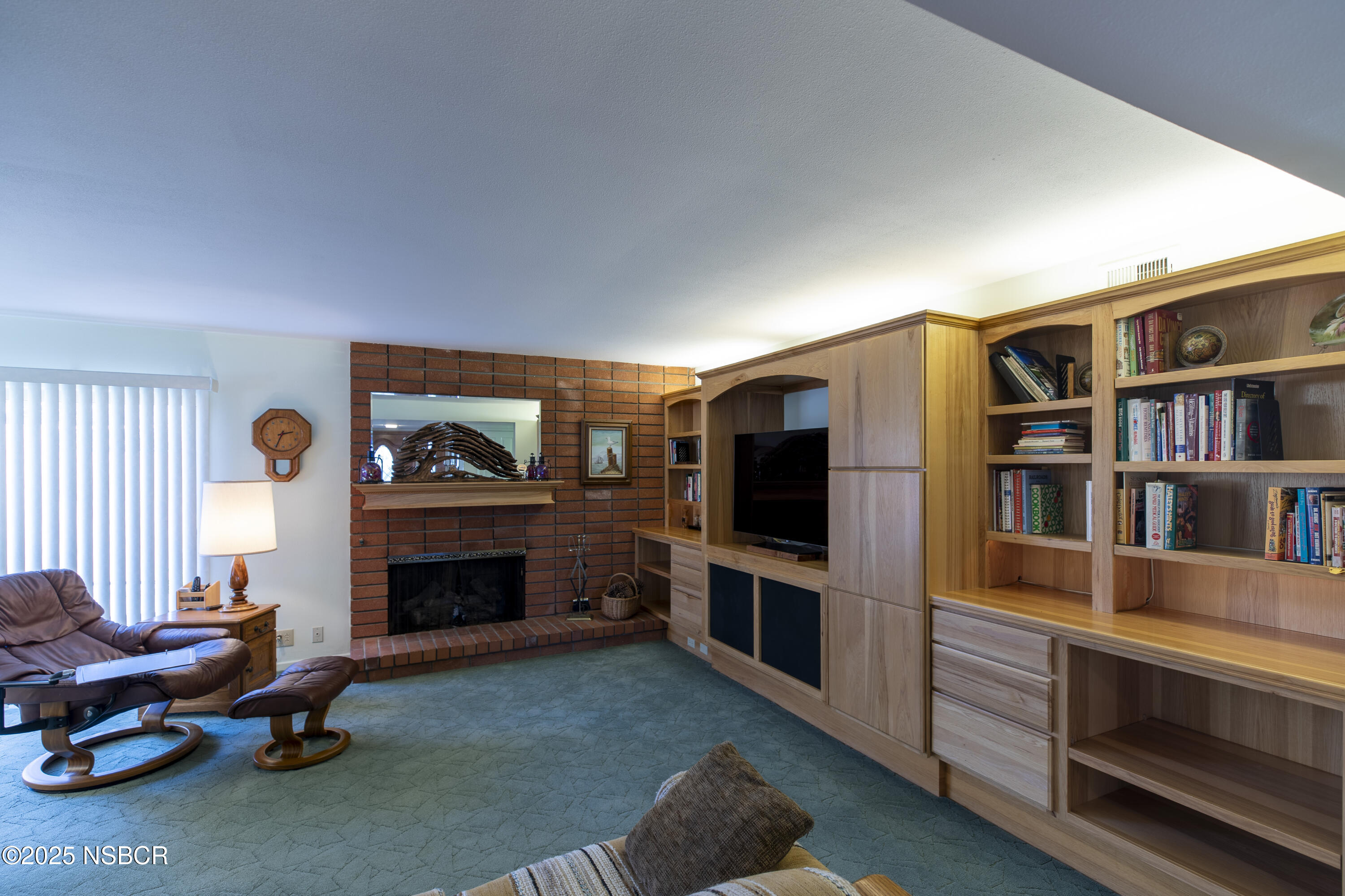 4490 Sirius Avenue Lompoc, CA 93436 - Photo 4 of 55 a living room with furniture and a fireplace