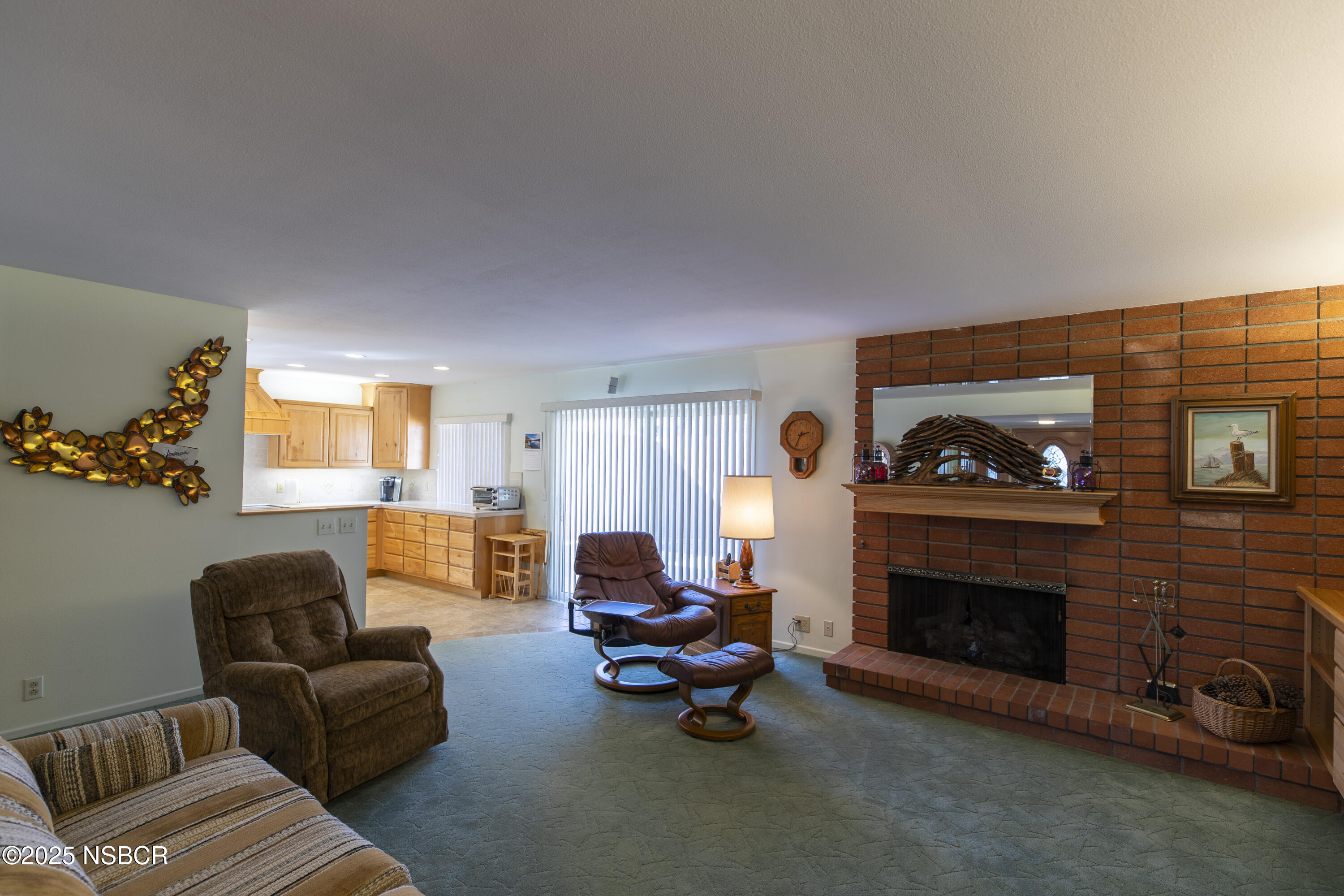 4490 Sirius Avenue Lompoc, CA 93436 - Photo 5 of 55 a living room with furniture and a fireplace