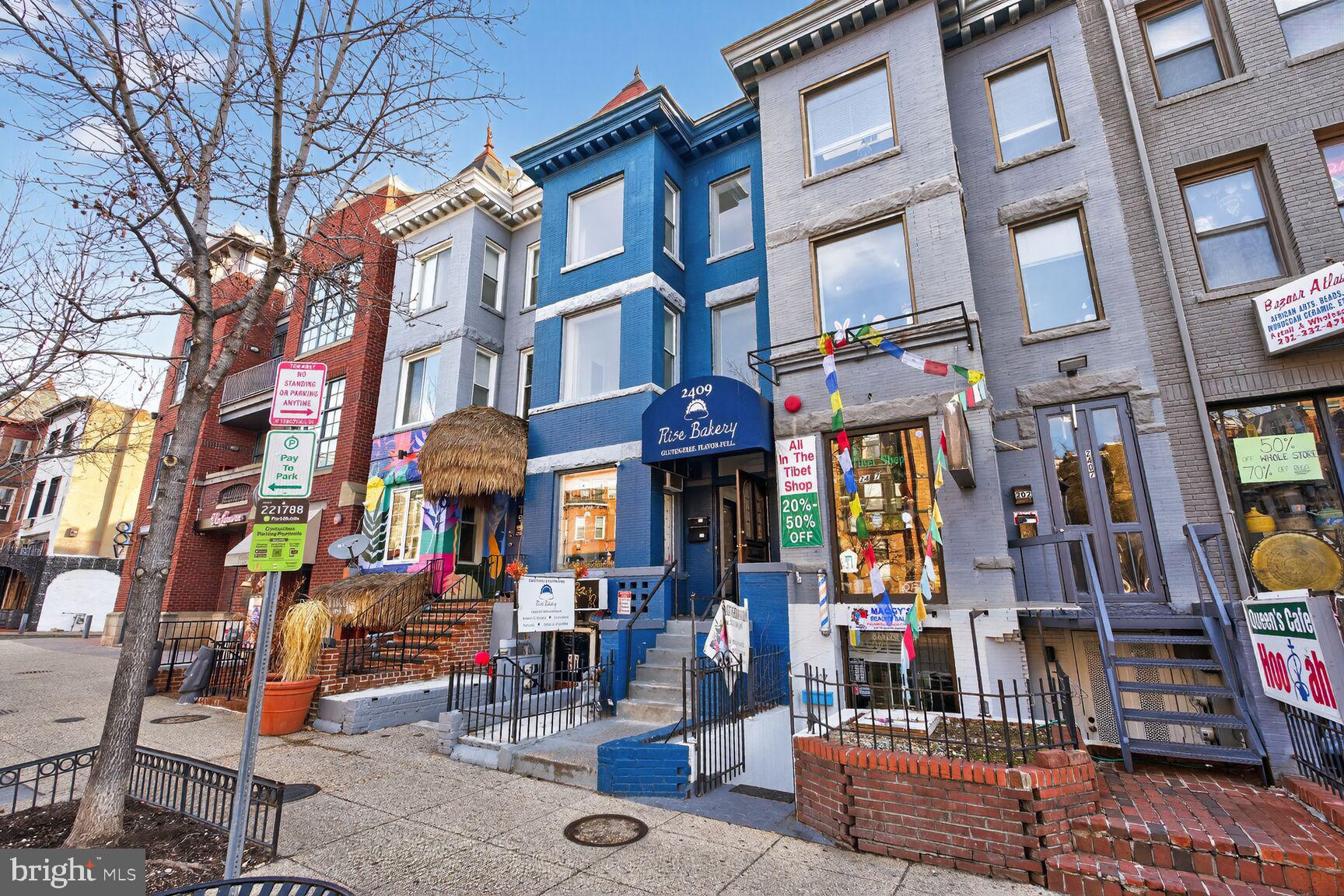 a view of street with shops