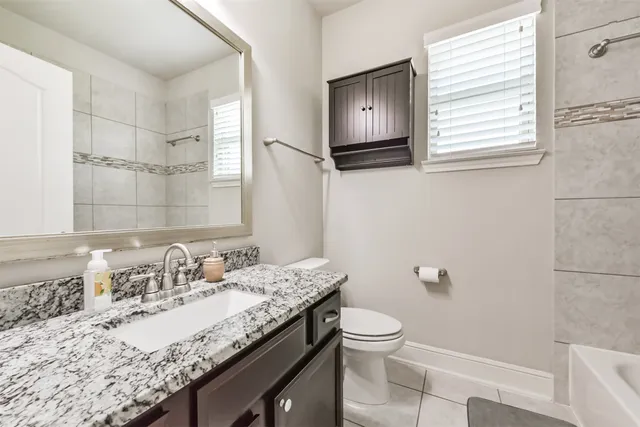 a living room with a rug