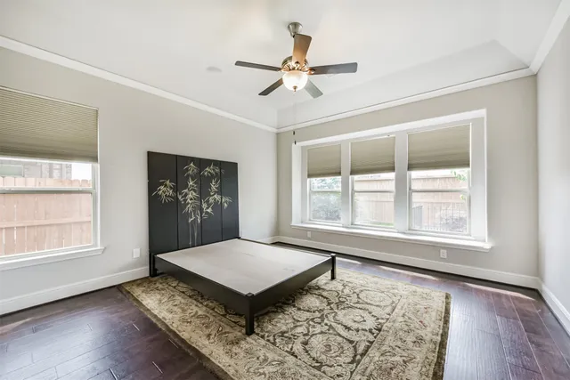 a bathroom with a granite countertop sink a large mirror and a shower
