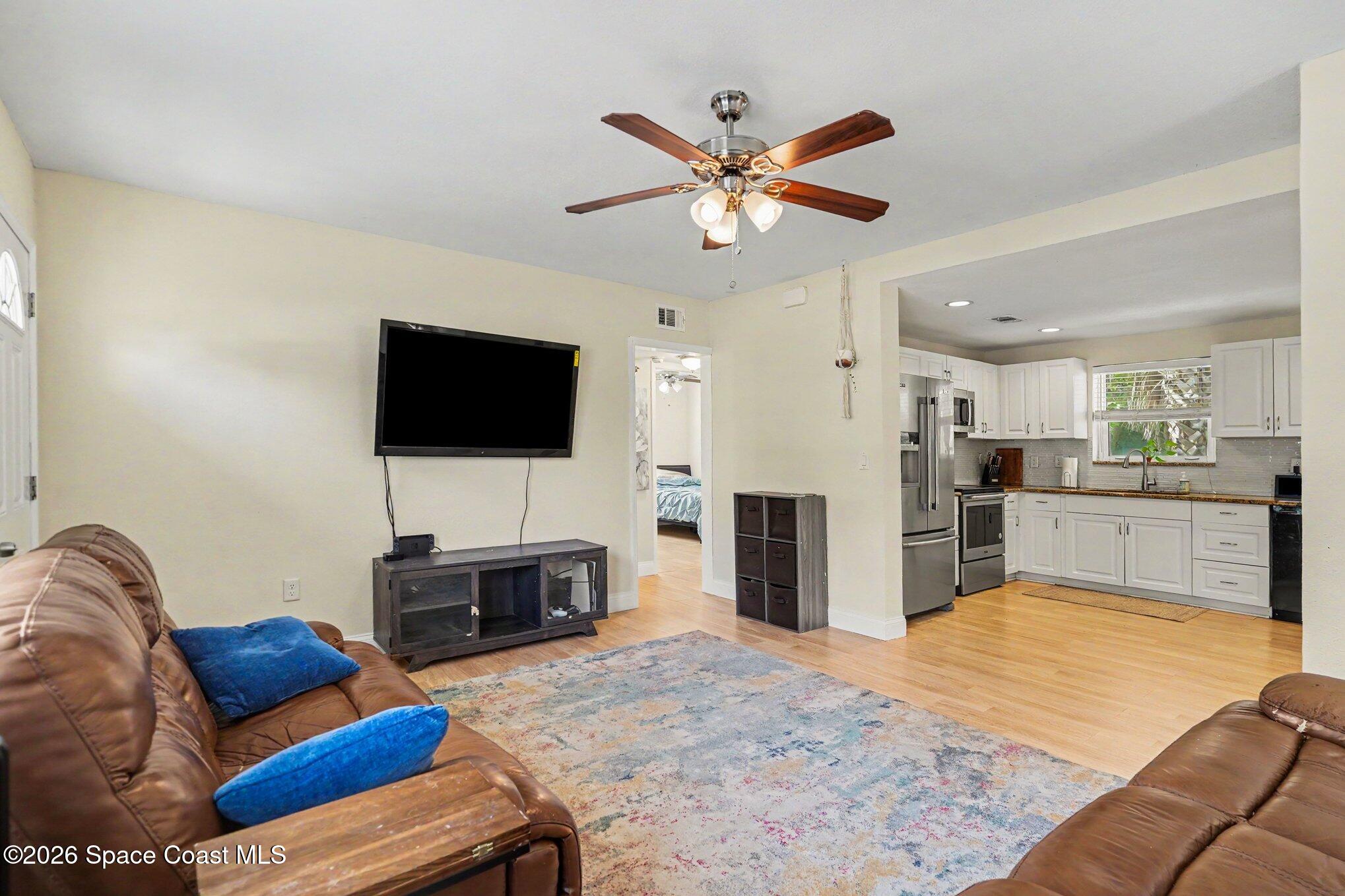 2556 1st Avenue Northeast Palm Bay, FL 32905 - Photo 4 of 27 005_file_1103