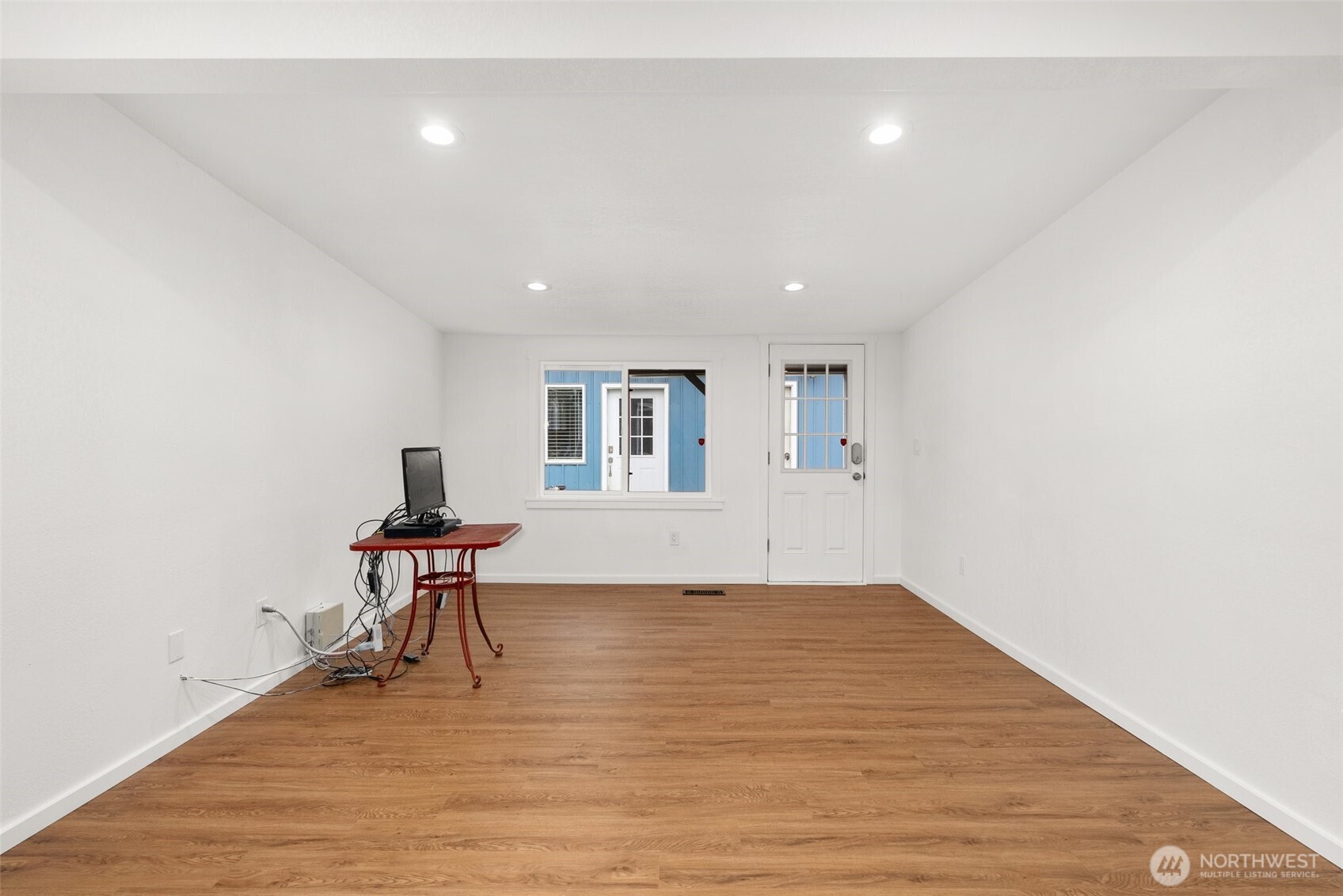 901 L Street Centralia, WA 98531 - Photo 11 of 28 a view of wooden floor and chairs in a room