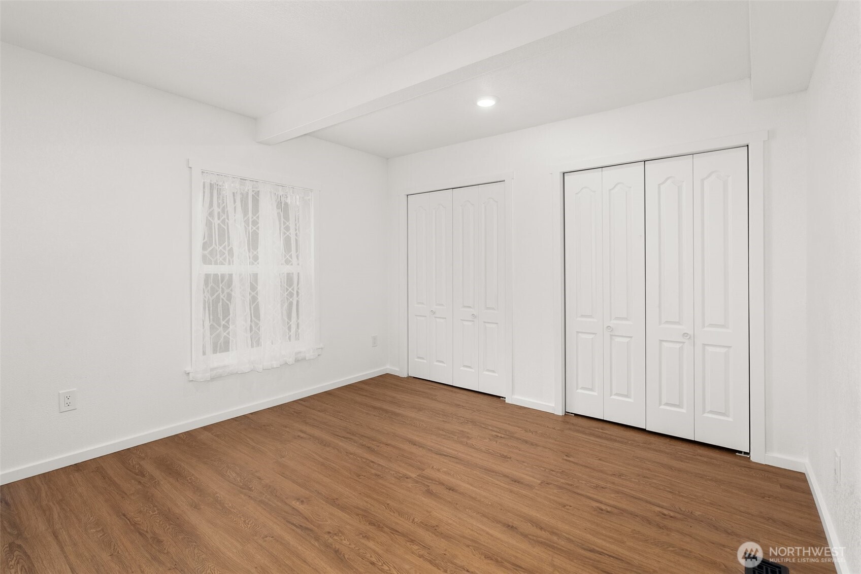 901 L Street Centralia, WA 98531 - Photo 13 of 28 a view of an empty room with wooden floor