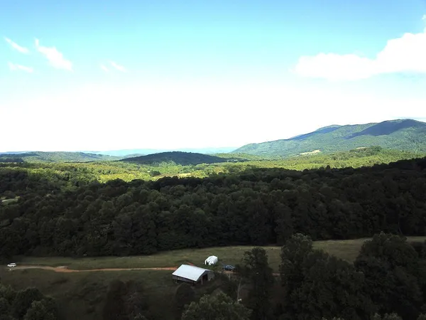 a view of mountain with lake view