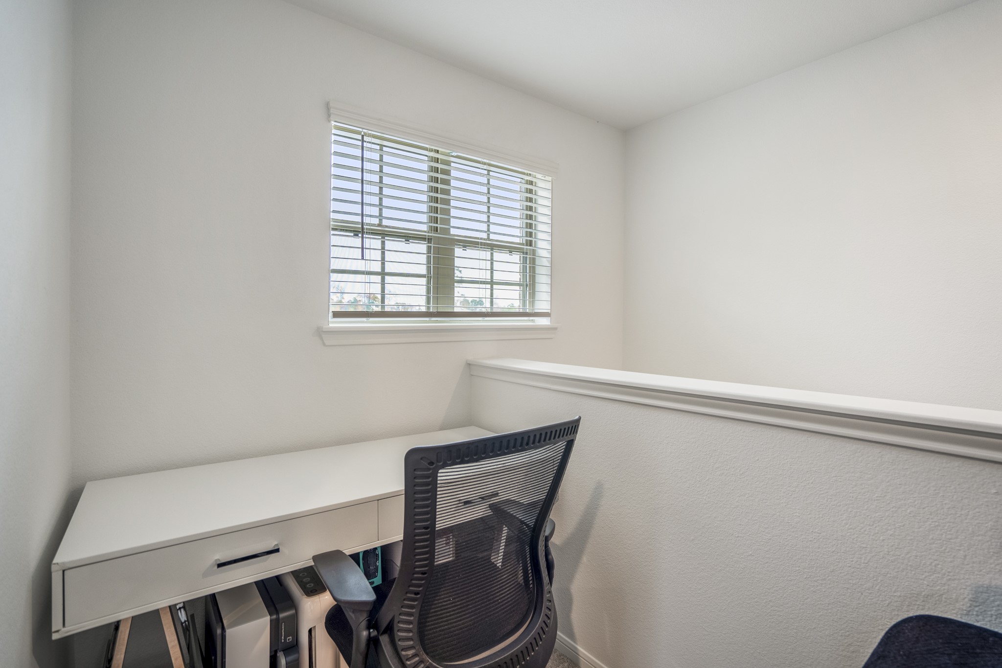 10477 Pineland Drive Willis, TX 77378 - Photo 17 of 27 a bathroom with a sink a toilet and a window