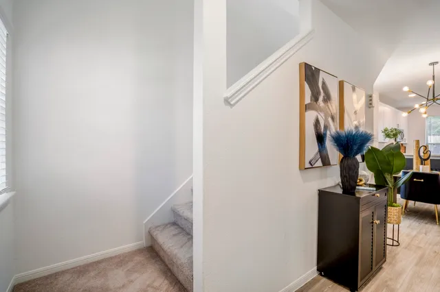 a bathroom with a double vanity sink mirror double and shower