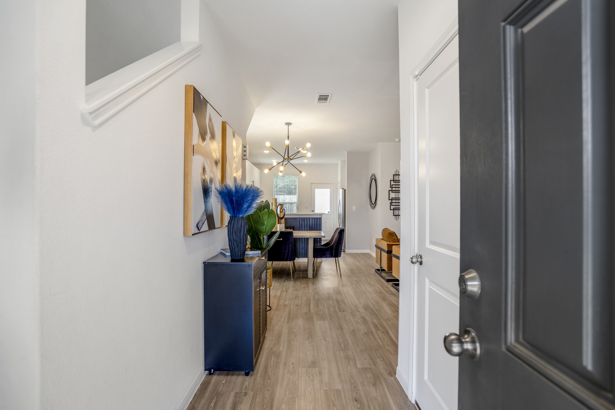 10477 Pineland Drive Willis, TX 77378 - Photo 2 of 27 a view of living room with furniture and wooden floor
