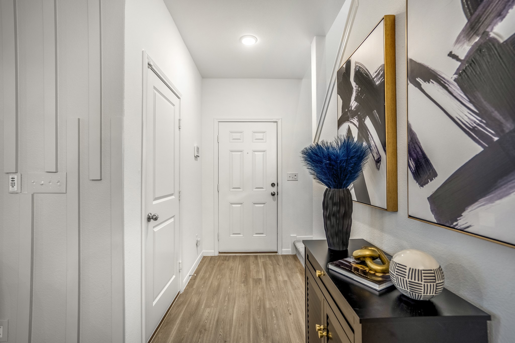 10477 Pineland Drive Willis, TX 77378 - Photo 3 of 27 a view of entryway with wooden floor